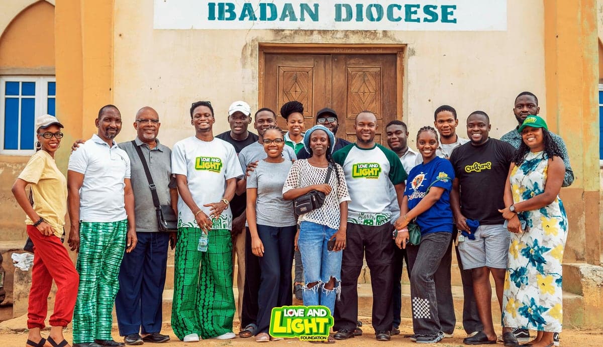 Love & Light Foundation volunteers and team members gathered outside a diocesan hall in Ibadan